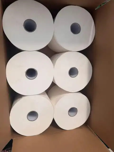 Open carton of Purnext 2-ply hand towel rolls showing the rolls inside